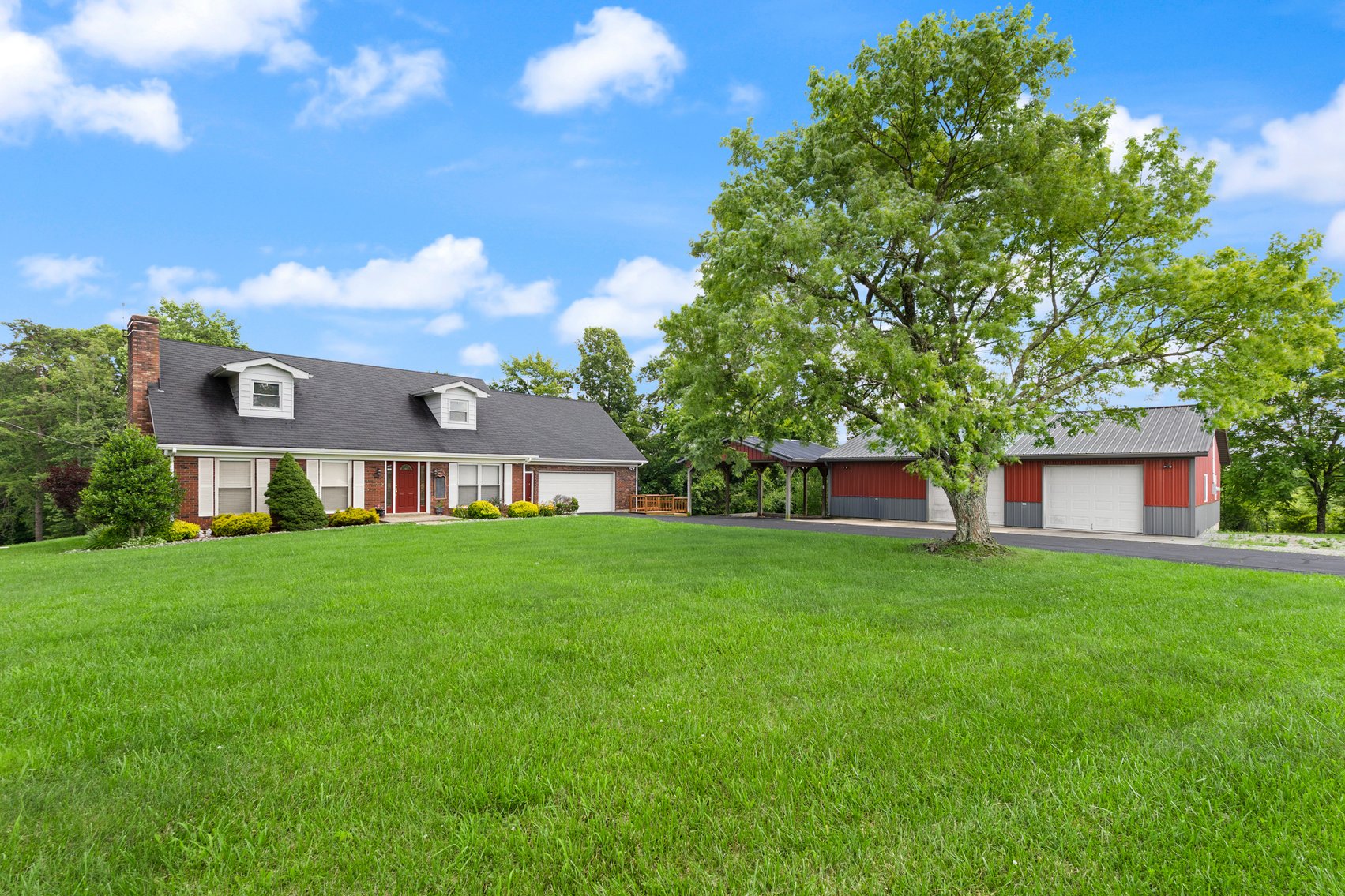 Image for Harrison County Real Estate Auction,  Cape Cod on 9.87 Acres, Inground Pool, Koi Pond & Finished Walkout - ONLINE AUCTION ONLY