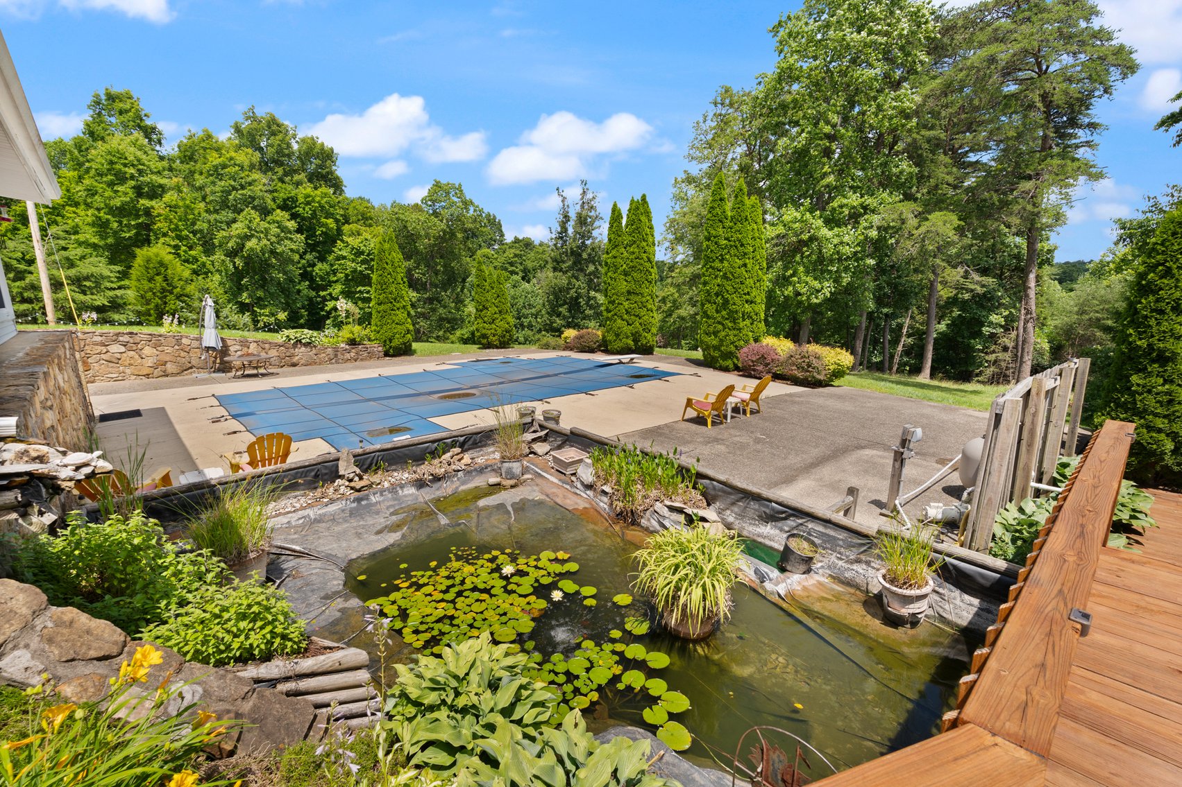 Image for Harrison County Real Estate Auction,  Cape Cod on 9.87 Acres, Inground Pool, Koi Pond & Finished Walkout - ONLINE AUCTION ONLY