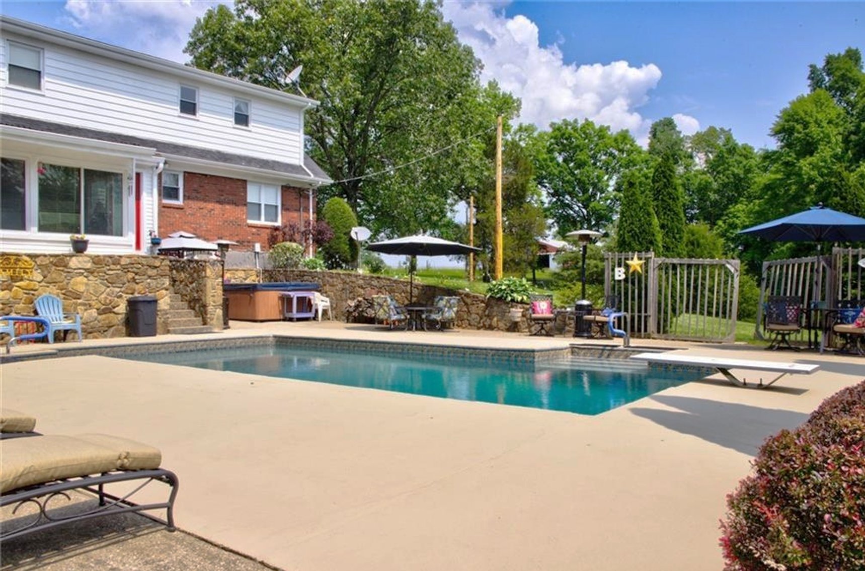 Image for Harrison County Real Estate Auction,  Cape Cod on 9.87 Acres, Inground Pool, Koi Pond & Finished Walkout - ONLINE AUCTION ONLY