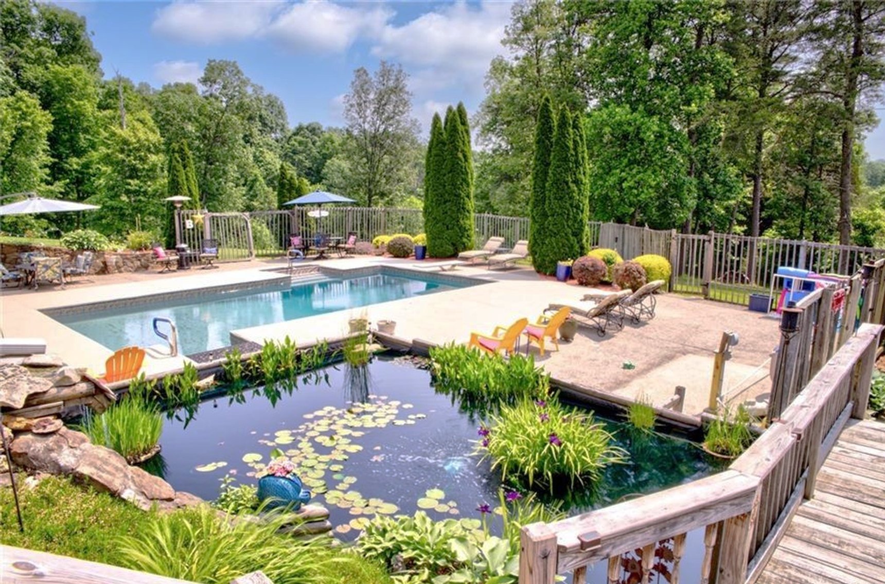 Image for Harrison County Real Estate Auction,  Cape Cod on 9.87 Acres, Inground Pool, Koi Pond & Finished Walkout - ONLINE AUCTION ONLY