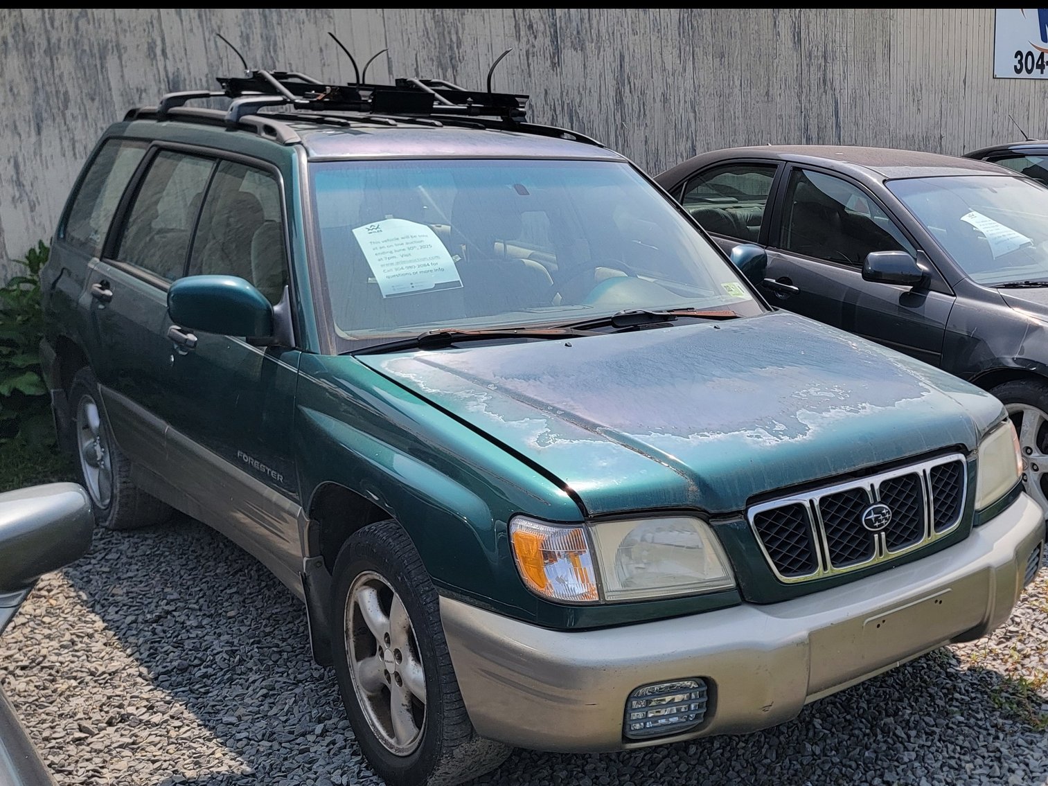 Image for Good News Mountaineer Garage Car Auction