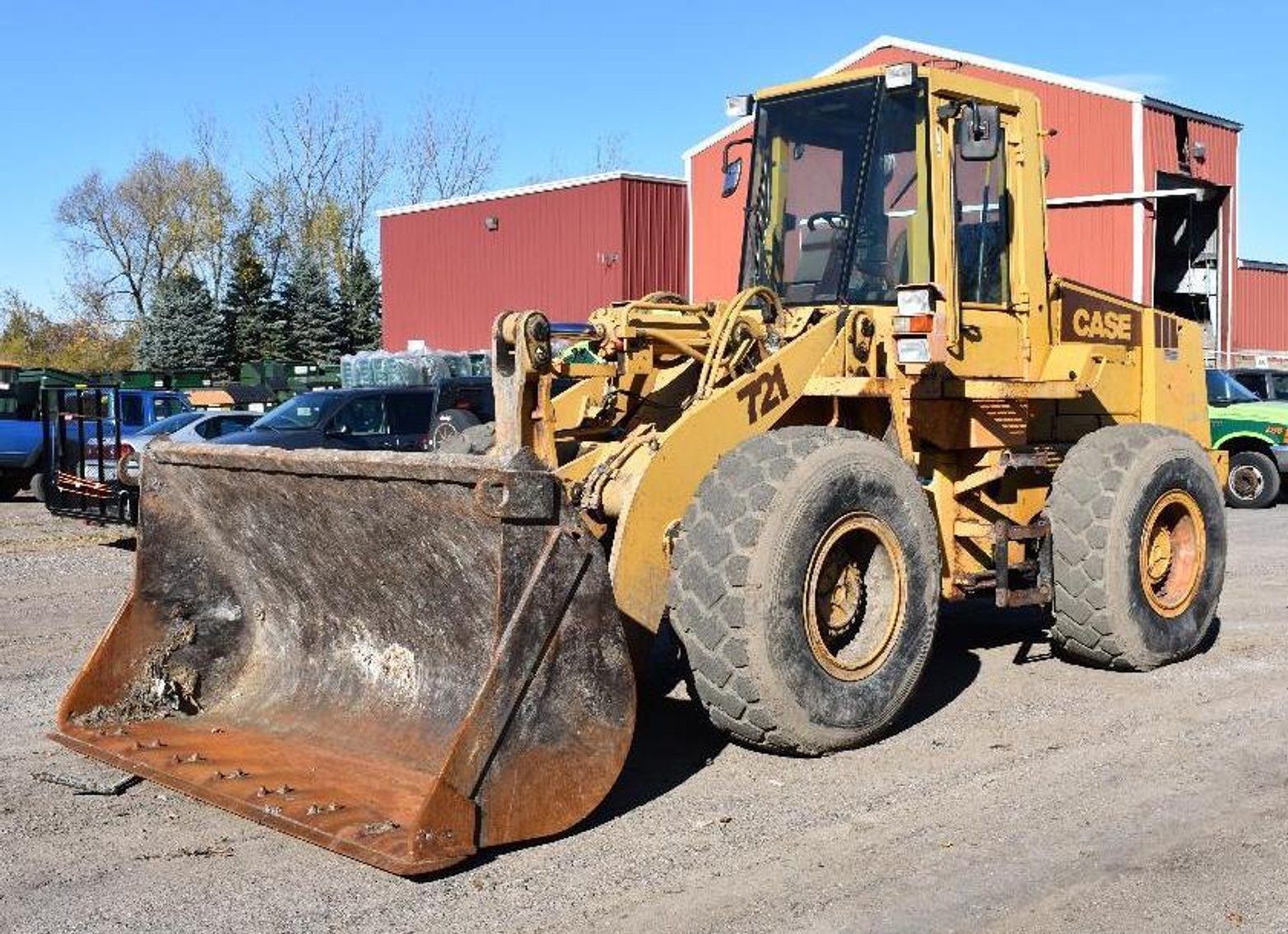 Roll off Truck and (12) Boxes, Case 721 Loader, and Cat 236B3 Skid Loader