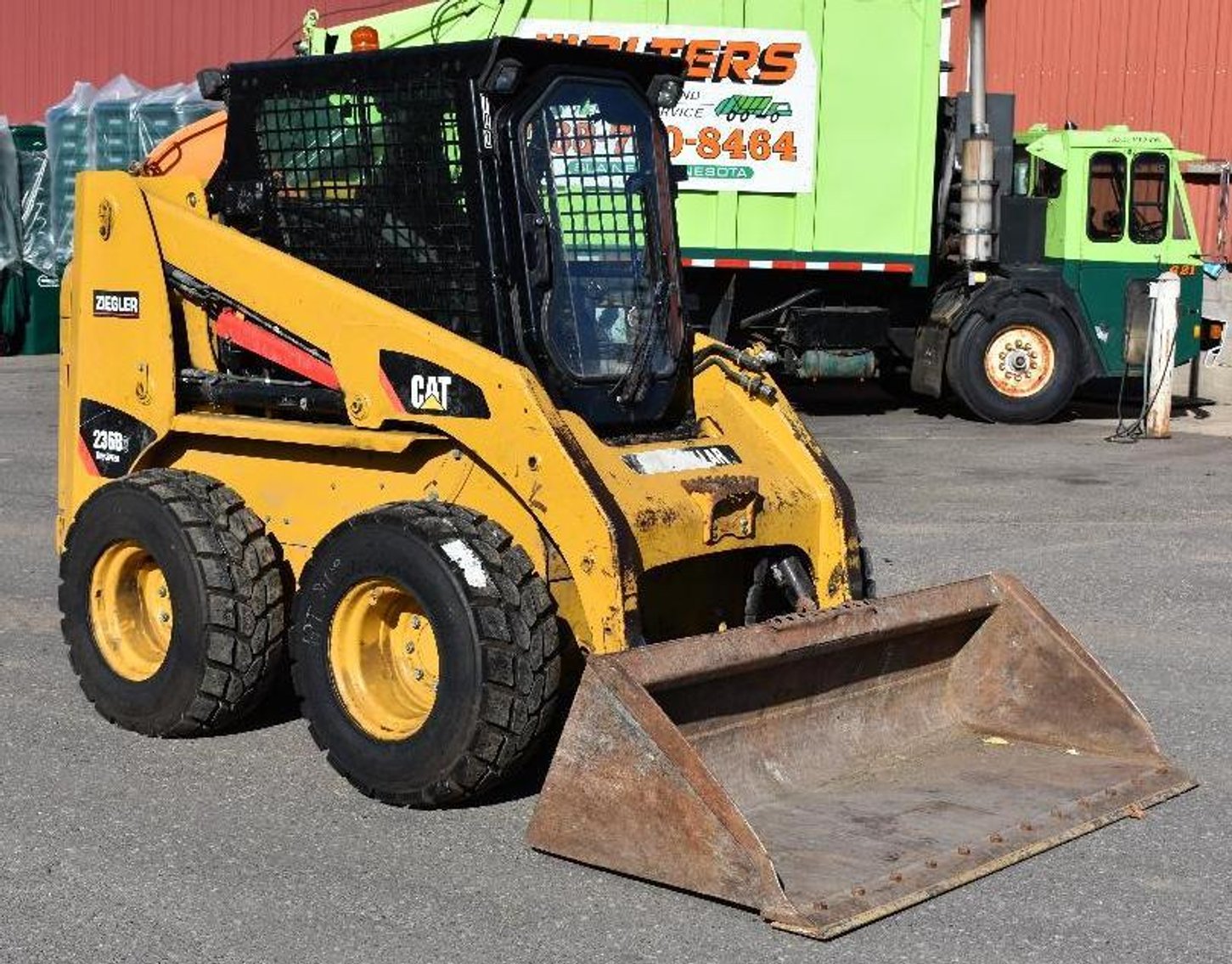 Roll off Truck and (12) Boxes, Case 721 Loader, and Cat 236B3 Skid Loader
