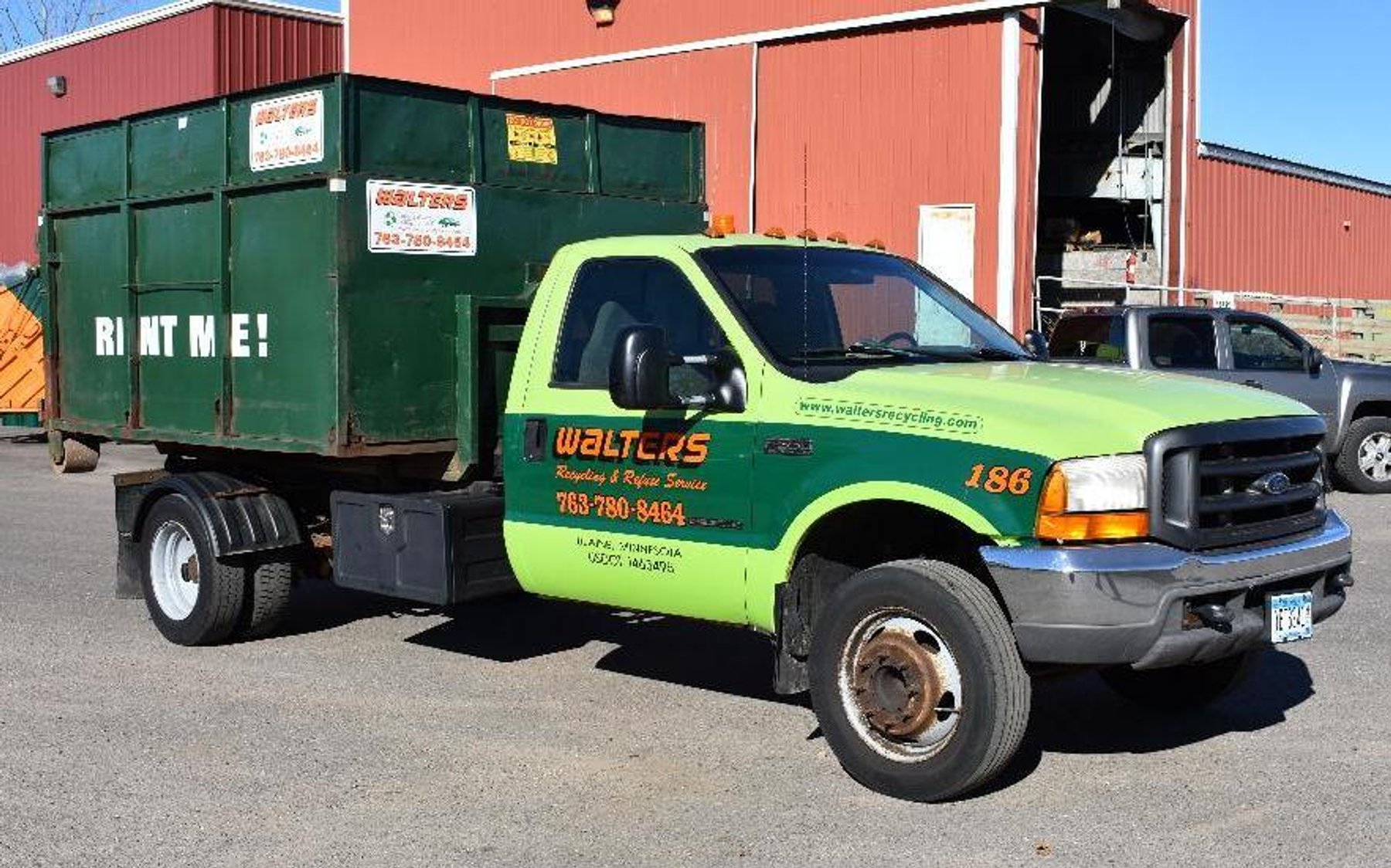Roll off Truck and (12) Boxes, Case 721 Loader, and Cat 236B3 Skid Loader