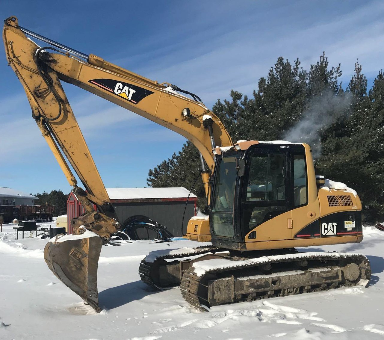 Construction Equipment: Cat 312CL, Trail King Low Boy, Trail Blazer Belly Dump, Telehandler