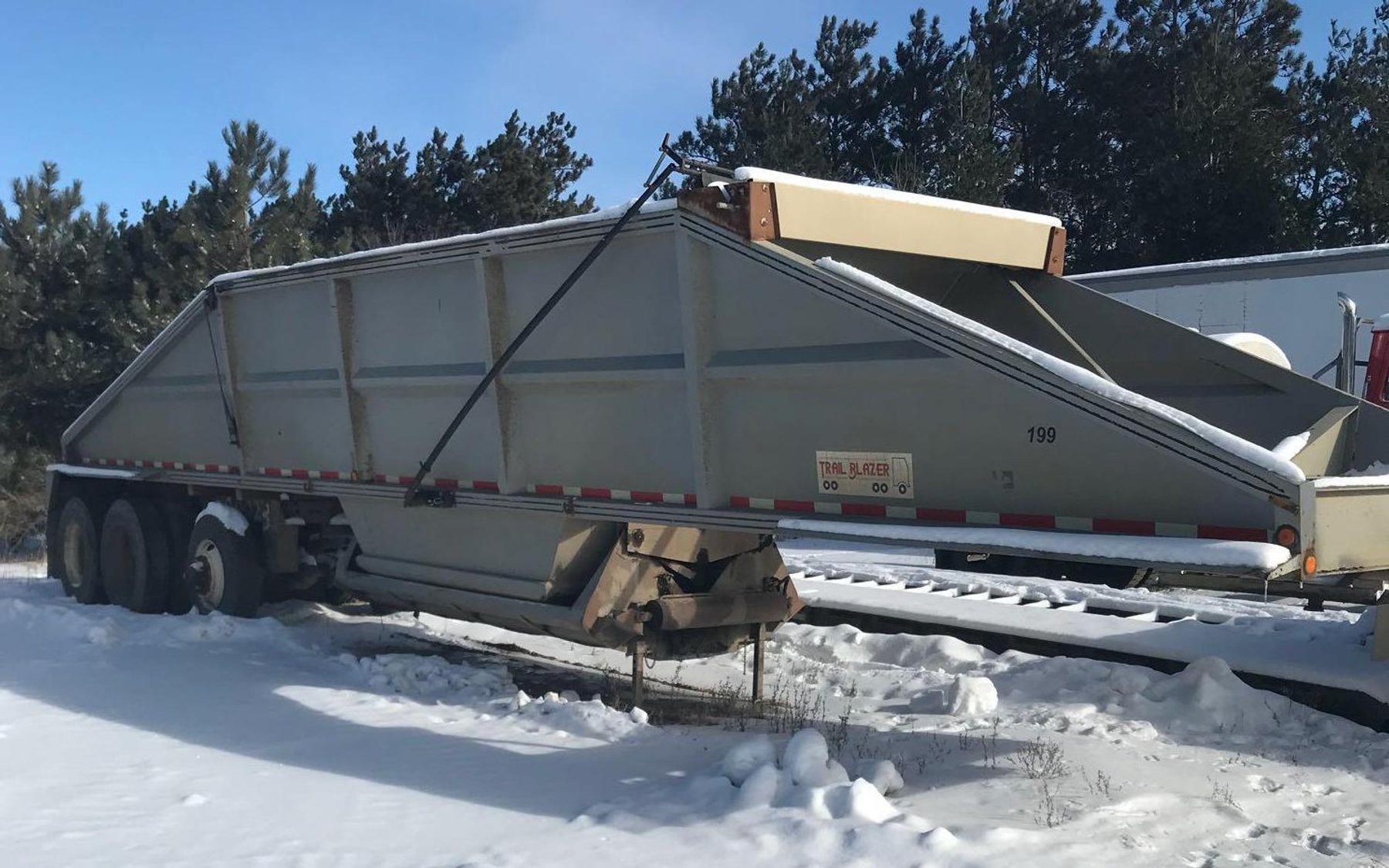 Construction Equipment: Cat 312CL, Trail King Low Boy, Trail Blazer Belly Dump, Telehandler
