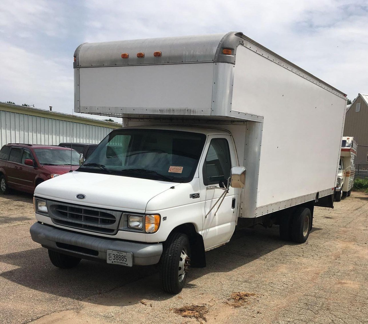 Early July Truck Auction: Dock Trucks, Cargo Vans, 2005 Flatbed Trailer