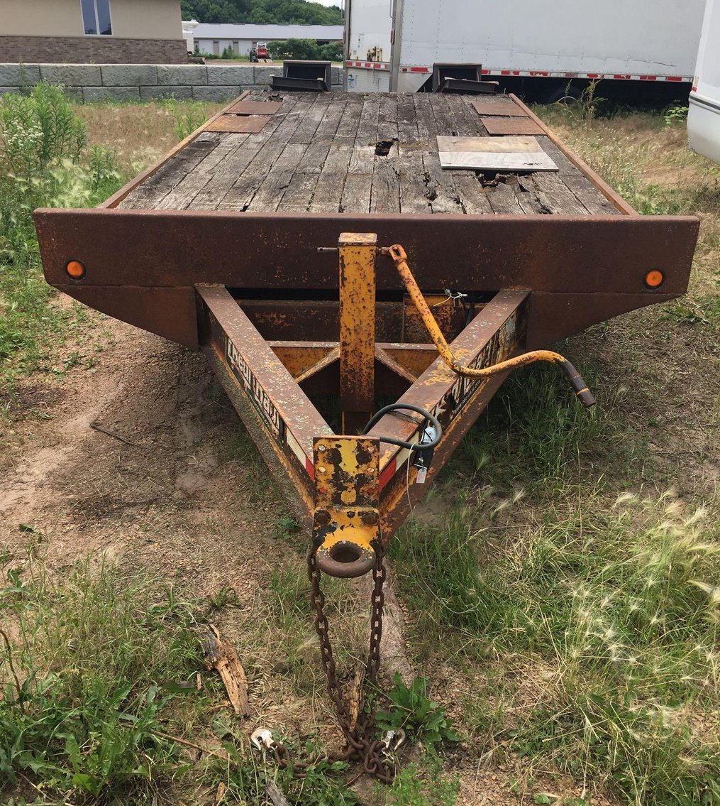 Early July Truck Auction: Dock Trucks, Cargo Vans, 2005 Flatbed Trailer