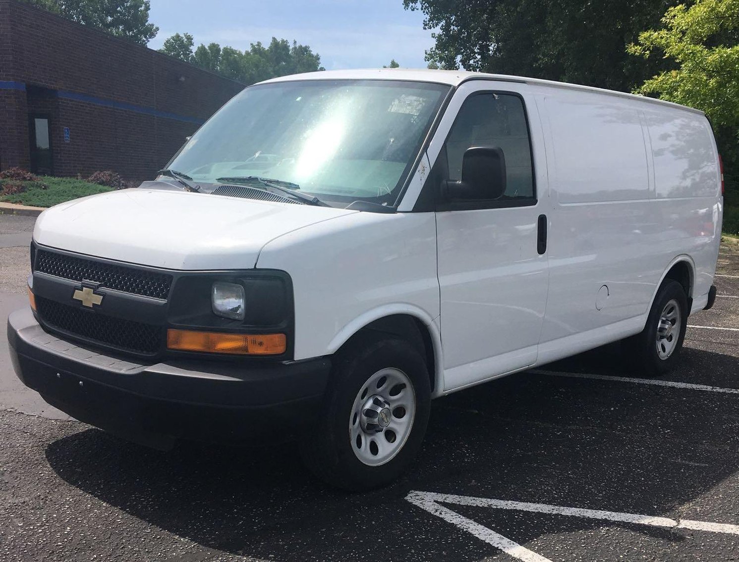 Early July Truck Auction: Dock Trucks, Cargo Vans, 2005 Flatbed Trailer