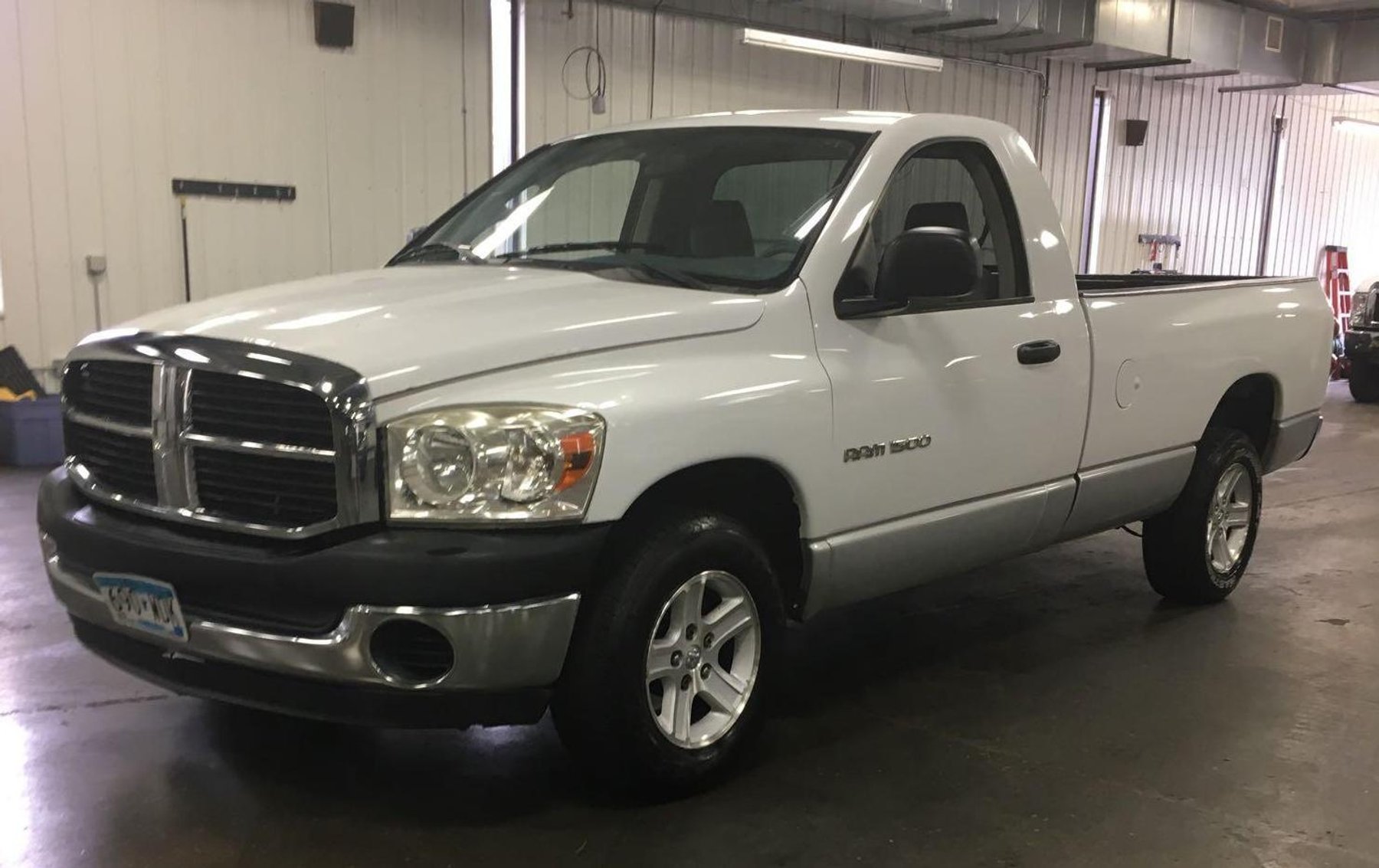 Early July Truck Auction: Dock Trucks, Cargo Vans, 2005 Flatbed Trailer