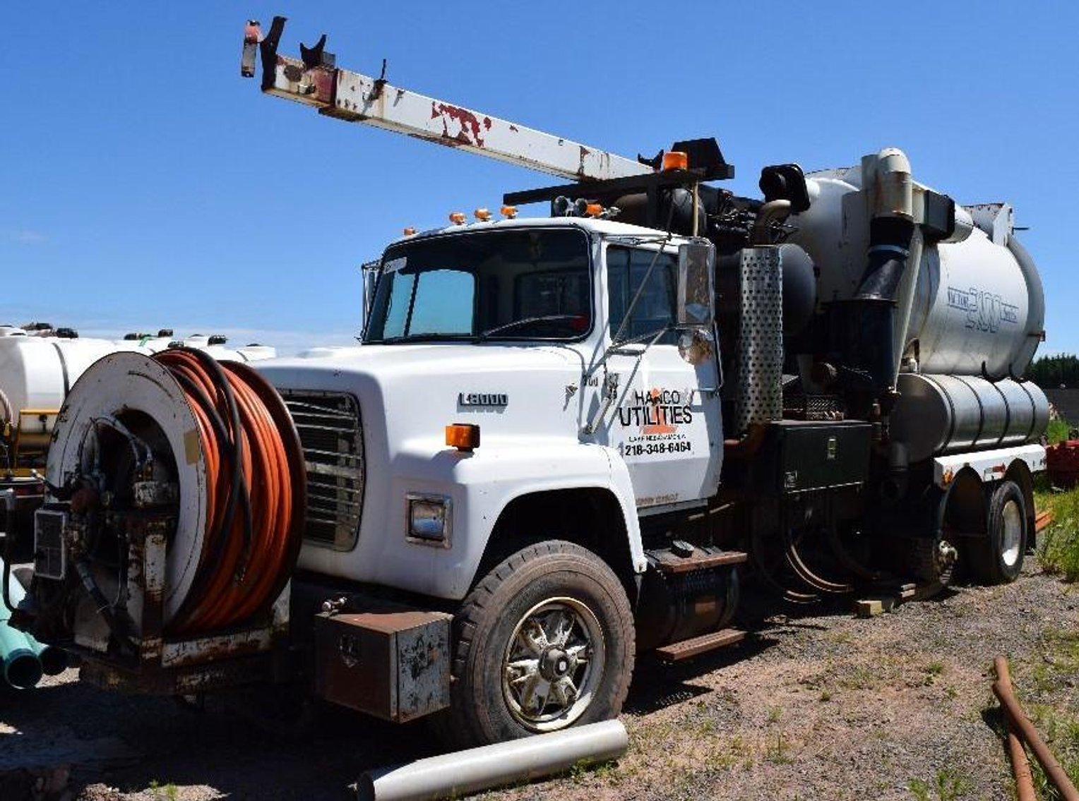 2011 Ford F-550 Truck - 2009 Ford F-350 Flatbed Truck - Pettibone C-8000 Telehander - Vac Truck