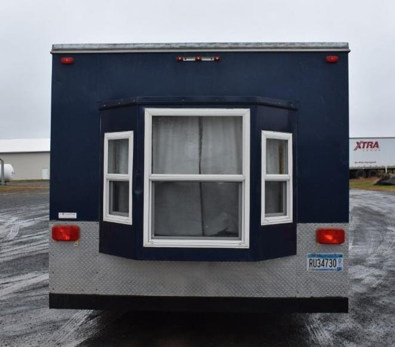 2011 Ice Castle 16' V American Eagle Drop Down Hydraulic Fish House