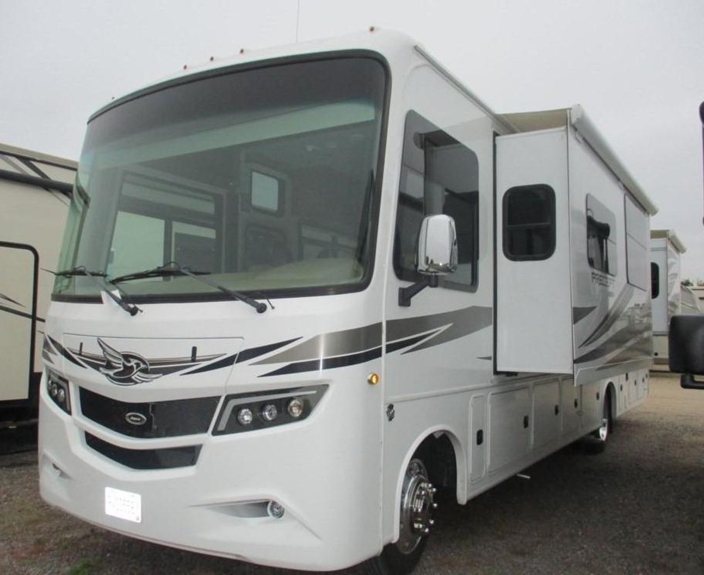 (17) Campers, (4) Motorhomes, 1969 Camaro SS Clone, 2015 Ice Castle, & (2) Trailers