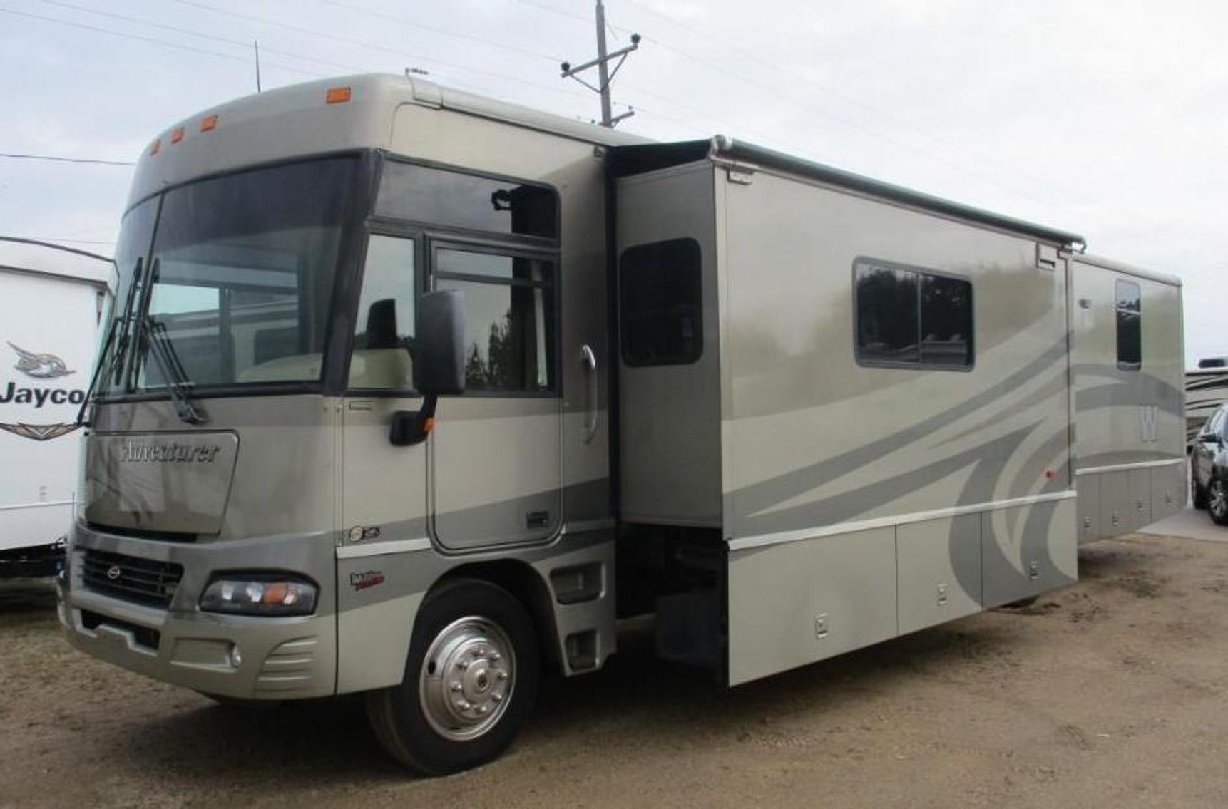 (17) Campers, (4) Motorhomes, 1969 Camaro SS Clone, 2015 Ice Castle, & (2) Trailers