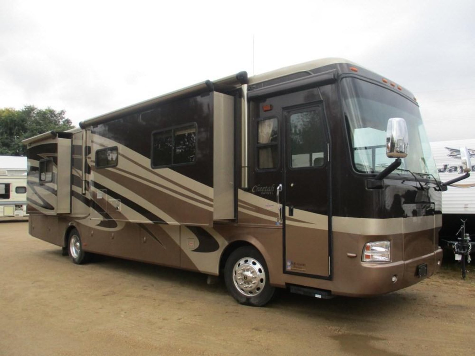 (17) Campers, (4) Motorhomes, 1969 Camaro SS Clone, 2015 Ice Castle, & (2) Trailers