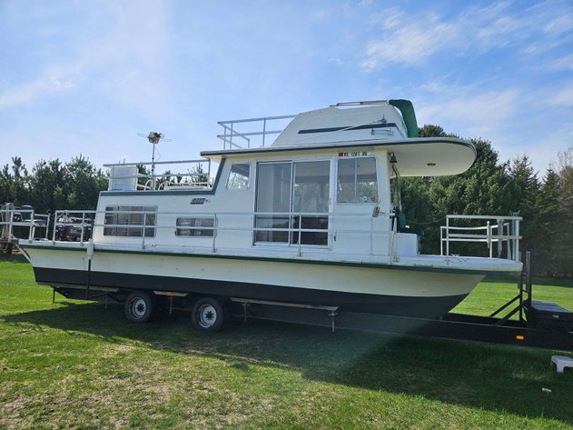 Image for Osakis, MN: Semi, Houseboat, Truck, Camper, Generators & More