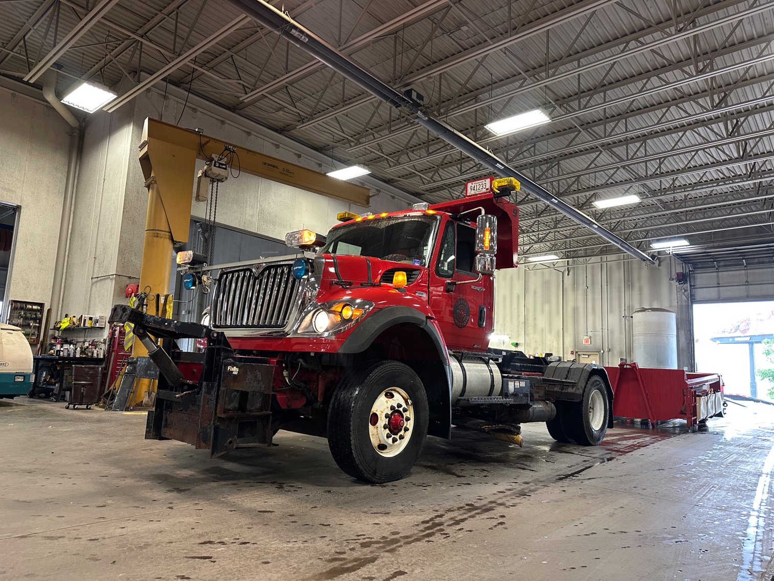 City of Rogers: 2012 International 7500 Work Star Hook Truck,  Roll Off Container, Plow Equipment (142288)