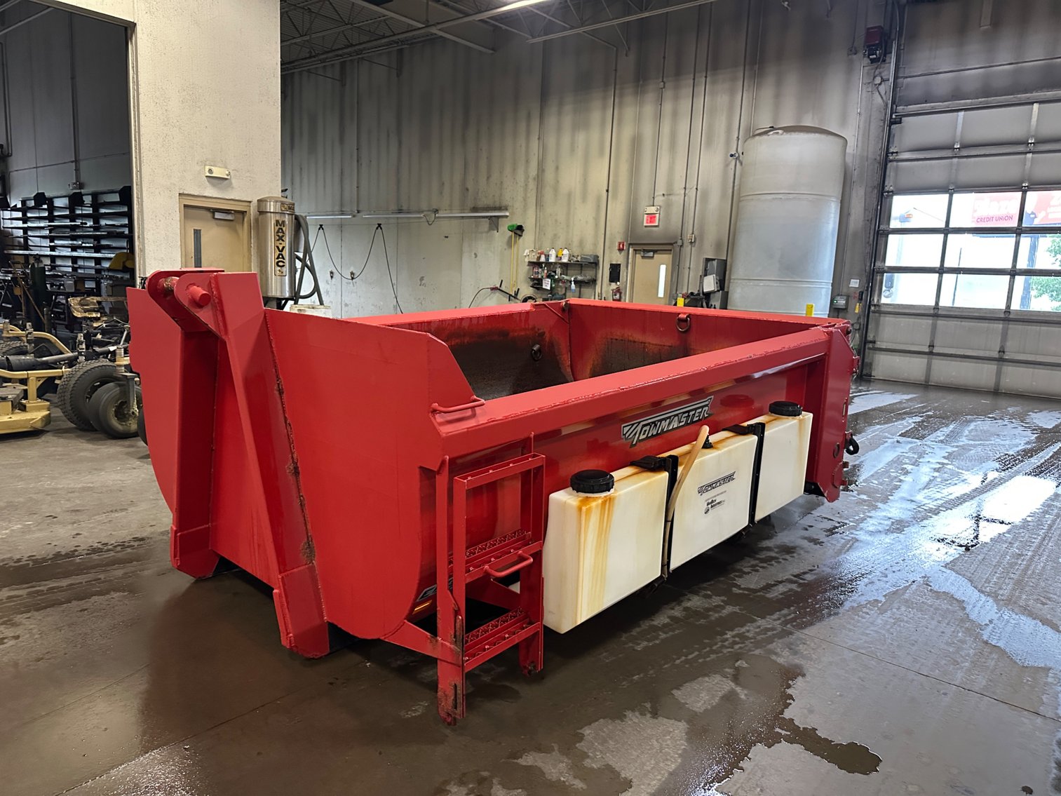 City of Rogers: 2012 International 7500 Work Star Hook Truck,  Roll Off Container, Plow Equipment (142288)