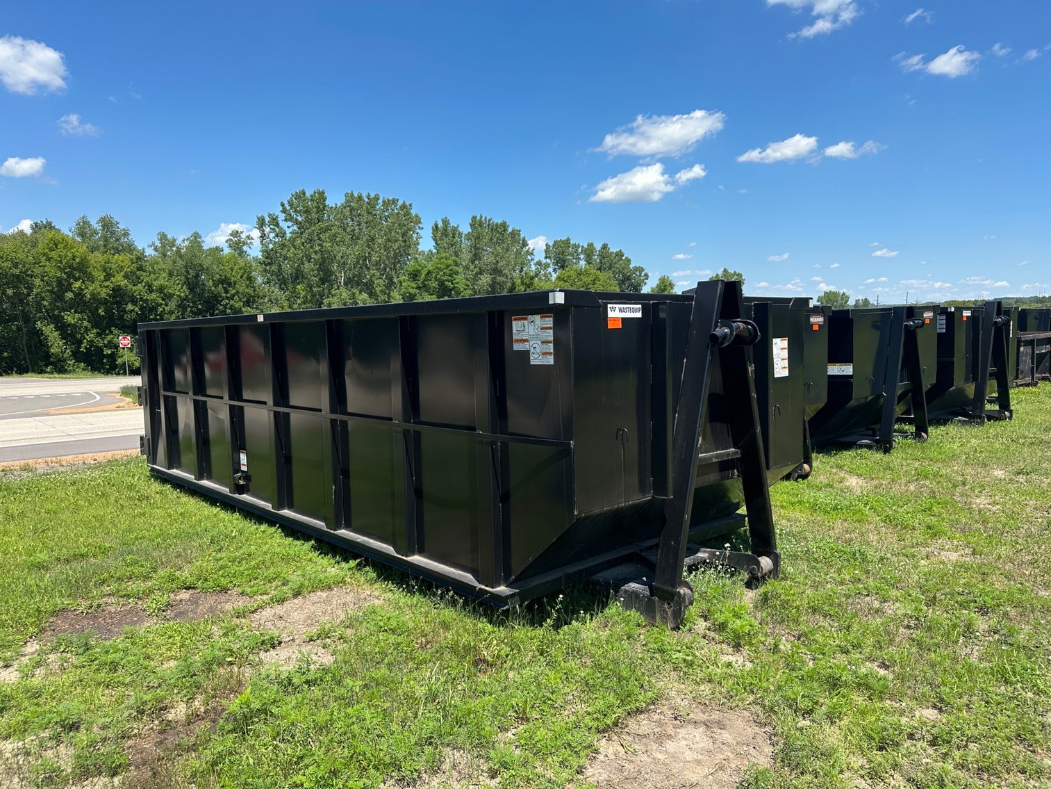 (2) Roll off Trucks & (26) Dumpsters