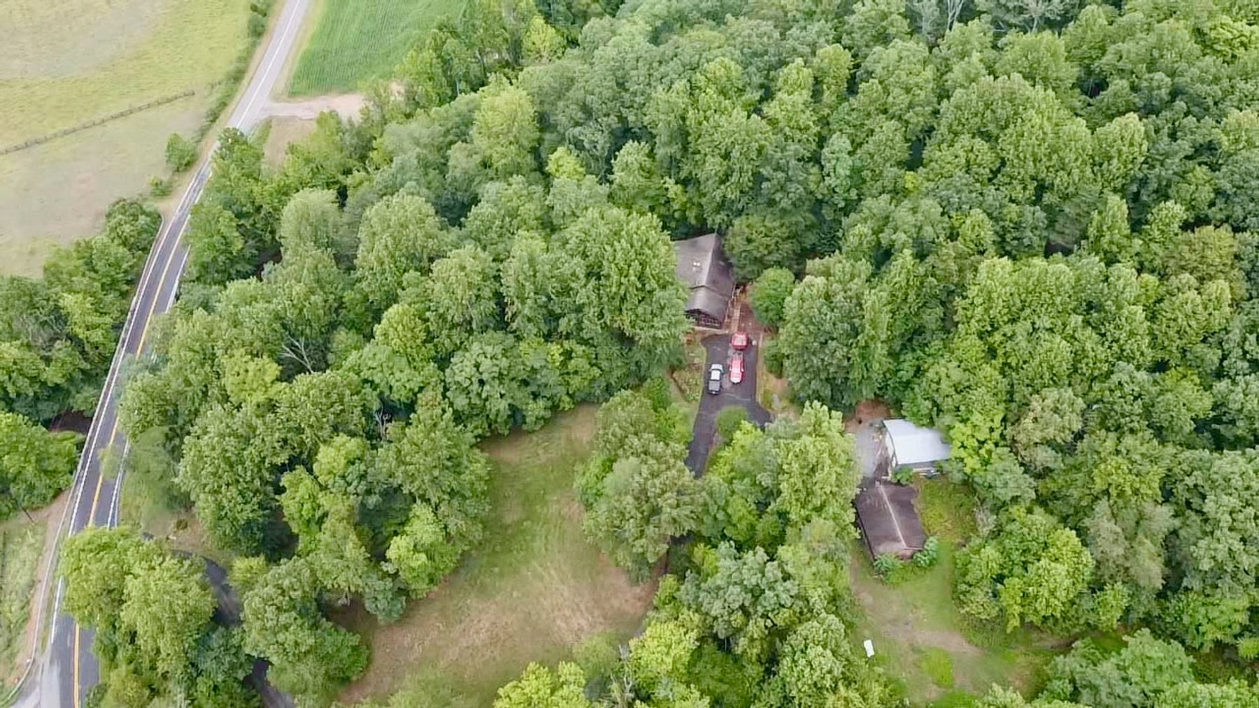 Image for 4 BR/2 BA Log Home on 7.9 +/- Acres w/400' +/- of Rapidan River Frontage & 2 Shops/Garages--Madison County, VA